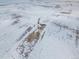 Wide aerial view of property showing house and fields at 9 Timberlake Ct, Byers, CO 80103