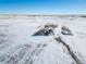 House in a snowy landscape, aerial view at 9 Timberlake Ct, Byers, CO 80103