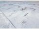 High-angle view of house and surrounding land in winter at 9 Timberlake Ct, Byers, CO 80103