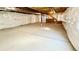 Large unfinished basement with insulated walls, concrete flooring, and a staircase at 9 Timberlake Ct, Byers, CO 80103