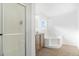 Bathroom with soaking tub, shower, and wood vanity at 9 Timberlake Ct, Byers, CO 80103