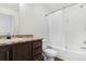 Bathroom with tub shower, vanity, and tile floor at 9 Timberlake Ct, Byers, CO 80103