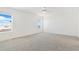 Spacious bedroom with plush carpeting and ample natural light at 9 Timberlake Ct, Byers, CO 80103