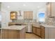 Modern kitchen with stainless steel appliances and an island at 9 Timberlake Ct, Byers, CO 80103