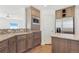 Modern kitchen with stainless steel appliances and wood cabinets at 9 Timberlake Ct, Byers, CO 80103