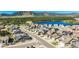 Elevated view of a peaceful residential area with beautiful lakes and mountain views at 17620 Leisure Lake Dr, Monument, CO 80132