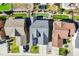 An aerial view shows the rooftops of a residential community, offering insights into neighborhood layout at 17620 Leisure Lake Dr, Monument, CO 80132