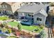 Backyard with a patio, an artificial grass area, and a fenced yard, perfect for outdoor living at 17620 Leisure Lake Dr, Monument, CO 80132
