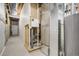 Unfinished basement with exposed ductwork and water heater at 17620 Leisure Lake Dr, Monument, CO 80132