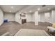 Finished basement with wet bar, wood-look floors, and ample space for entertaining at 17620 Leisure Lake Dr, Monument, CO 80132