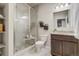 Beautiful bathroom with a glass-enclosed shower, decorative accents, vanity with granite countertop, and accent plants at 17620 Leisure Lake Dr, Monument, CO 80132