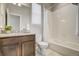 Bathroom features granite vanity, white subway tile shower, and modern fixtures at 17620 Leisure Lake Dr, Monument, CO 80132