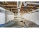 View of a clean crawl space with vapor barrier and insulation at 17620 Leisure Lake Dr, Monument, CO 80132