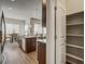 Open concept kitchen with stainless steel appliances, granite countertops, and dark wood cabinets at 17620 Leisure Lake Dr, Monument, CO 80132