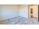 Cozy bedroom featuring plush carpeting and a closet at 12625 Madison Way, Thornton, CO 80241