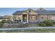 Beautiful exterior view showcasing well-maintained landscaping and charming details at 12625 Madison Way, Thornton, CO 80241