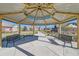 Interior view of a gazebo featuring comfortable seating and neighborhood views at 12625 Madison Way, Thornton, CO 80241