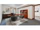 Office with a desk, shelves, chairs, a large window, and stylish decor at 16420 Martingale Dr, Parker, CO 80134