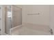 Clean bathroom featuring a shower with glass door and a separate soaking tub with tile surround at 2552 W 82Nd Ln # C, Westminster, CO 80031
