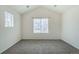 Bright bedroom with vaulted ceiling and newer carpet offers great natural light at 2552 W 82Nd Ln # C, Westminster, CO 80031