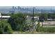 Distant view of the cityscape over the tree line at 2552 W 82Nd Ln # C, Westminster, CO 80031