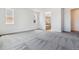 Spacious bedroom with large windows, carpet flooring, and neutral walls with attached bath at 564 Penn Rd, Elizabeth, CO 80107