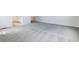 Spacious bedroom with large windows, carpet flooring, and neutral walls at 564 Penn Rd, Elizabeth, CO 80107