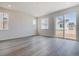 Bright living room with recessed lighting, and large windows to let in plenty of natural light at 564 Penn Rd, Elizabeth, CO 80107