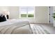 Serene main bedroom offers a large window with scenic views at 385 East St, Louisville, CO 80027