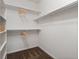Bright walk-in closet with carpeted floor and ample shelving at 15496 W 66Th Dr # B, Arvada, CO 80007