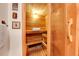 Private sauna with cedar wood construction and glass door, creating a tranquil and rejuvenating space at 7753 Red Fox Dr, Evergreen, CO 80439