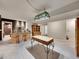 Basement with decorative pool table lighting, and a wet bar at 7809 S Flower St, Littleton, CO 80128
