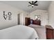 Bright and spacious bedroom with ample closet space and natural light at 7809 S Flower St, Littleton, CO 80128