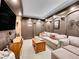 Comfortable movie room with a large television screen and ample seating at 7809 S Flower St, Littleton, CO 80128