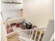 A birds-eye view that captures the spacious living room with a fireplace and stylish furnishings at 8300 Fairmount Dr # M103, Denver, CO 80247