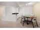 Functional basement with a wet bar and game table, ideal for entertaining or hobbies at 1892 W Kettle Ave, Littleton, CO 80120