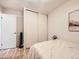 Simple bedroom with a large closet, neutral tones, and natural light creates a comfortable atmosphere at 10895 Fairfax Way, Thornton, CO 80233