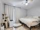 Relaxing bedroom with a neutral color palette, soft textures, and natural light at 10895 Fairfax Way, Thornton, CO 80233