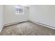 The room features neutral paint and carpet, creating a blank canvas for your personal touch at 10895 Fairfax Way, Thornton, CO 80233