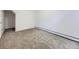 The room features neutral paint and carpet, creating a blank canvas for your personal touch at 10895 Fairfax Way, Thornton, CO 80233