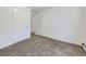 A simple room featuring neutral paint and carpet creating a blank canvas for your personal touch at 10895 Fairfax Way, Thornton, CO 80233
