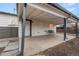 A covered back patio offers a comfortable outdoor living space at 13605 E 13Th Ave, Aurora, CO 80011