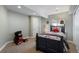 bedroom with playful decor, a bed, and window light at 744 Kryptonite Dr, Castle Rock, CO 80108