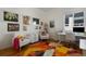 Bright office with a colorful rug, modern furniture, and lots of natural light at 744 Kryptonite Dr, Castle Rock, CO 80108