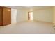 Basement with carpeted flooring and radiator at 833 Applewood Dr, Lafayette, CO 80026