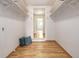 Empty walk-in closet with white walls and wood floors at 833 Applewood Dr, Lafayette, CO 80026