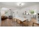 Spacious open concept living space with hardwood floors, natural light, and modern decor at 4955 Julian St, Denver, CO 80221
