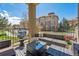 Balcony featuring outdoor seating with a view of the street and neighborhood at 7814 Inverness Blvd, Englewood, CO 80112