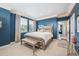 Beautiful main bedroom with bright windows, ambient lighting, and stylish decor at 7814 Inverness Blvd, Englewood, CO 80112