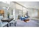 Spacious living room showcasing an open layout, stylish furnishings, and seamless flow to other living spaces at 7285 S Yukon Ct, Littleton, CO 80128